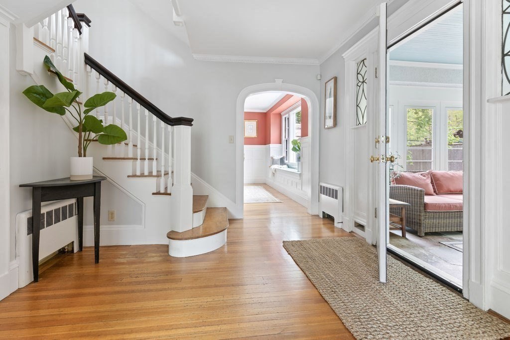 311 Clark Road Brookline, MA 02445 - Photo 2 of 26 a living room with furniture and a wooden floor