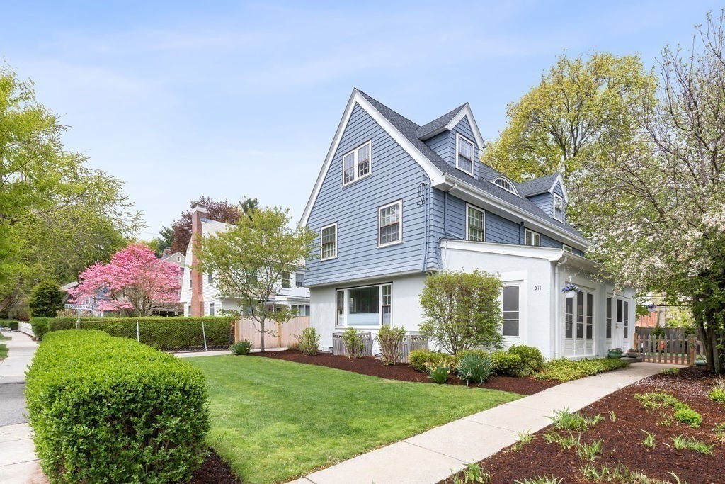311 Clark Road Brookline, MA 02445 - Photo 26 of 26 a front view of a house with a yard and garage
