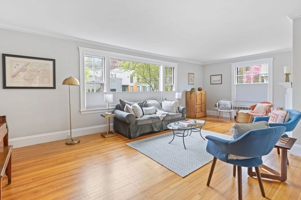 311 Clark Road Brookline, MA 02445 - Photo 3 of 26 a living room with furniture and a large window