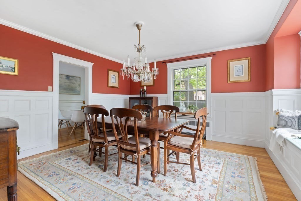 311 Clark Road Brookline, MA 02445 - Photo 5 of 26 a view of a dining room with furniture window and wooden floor