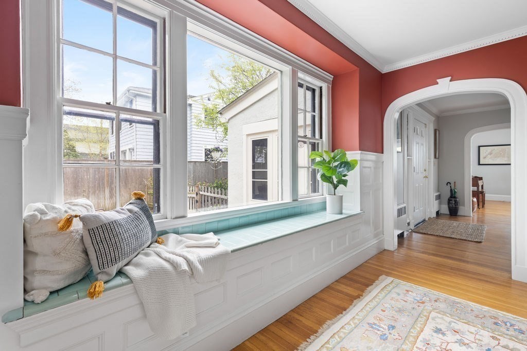 311 Clark Road Brookline, MA 02445 - Photo 6 of 26 a living room with furniture and a large window