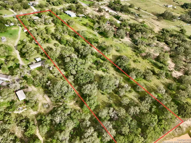 a view of a lush green field