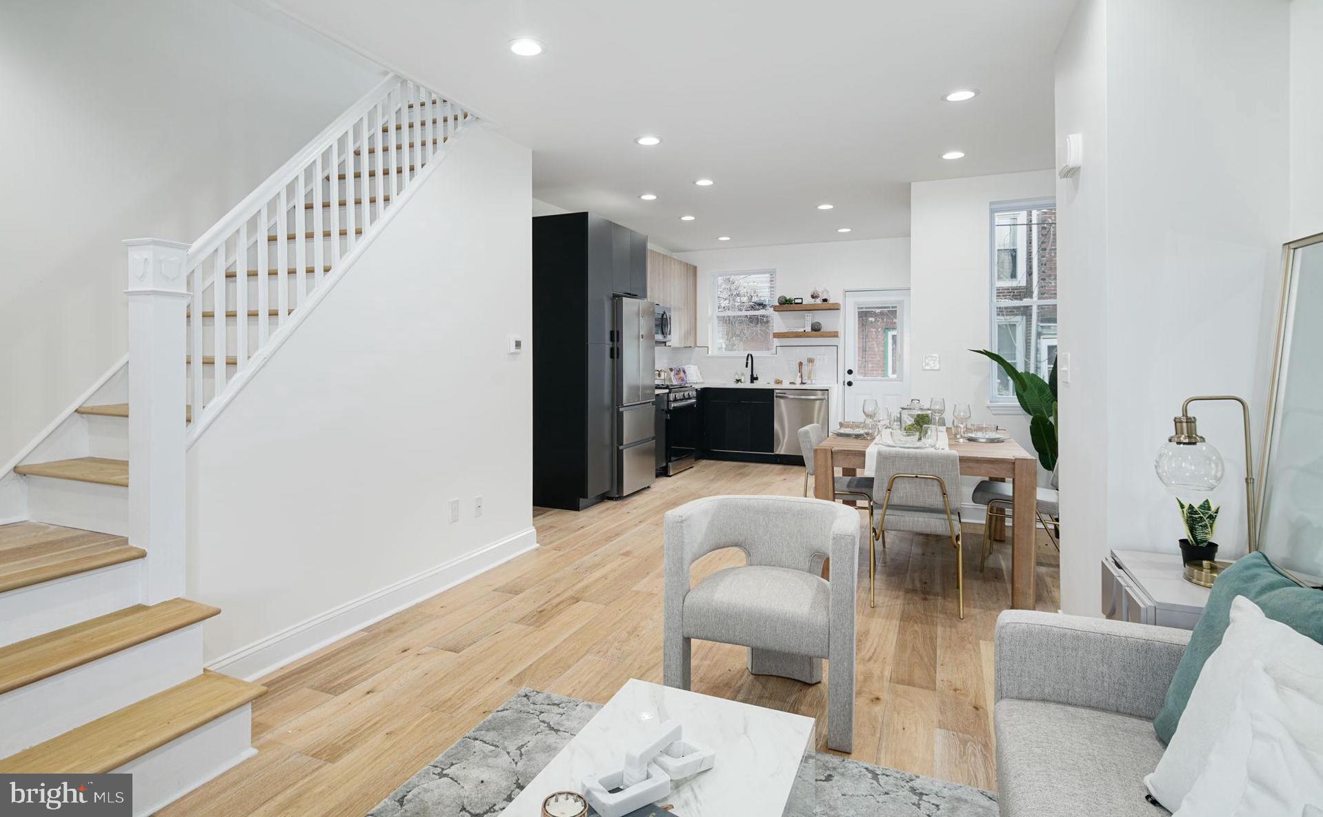 1336 North Taney Street Philadelphia, PA 19121 - Photo 1 of 23 a living room with furniture and a wooden floor