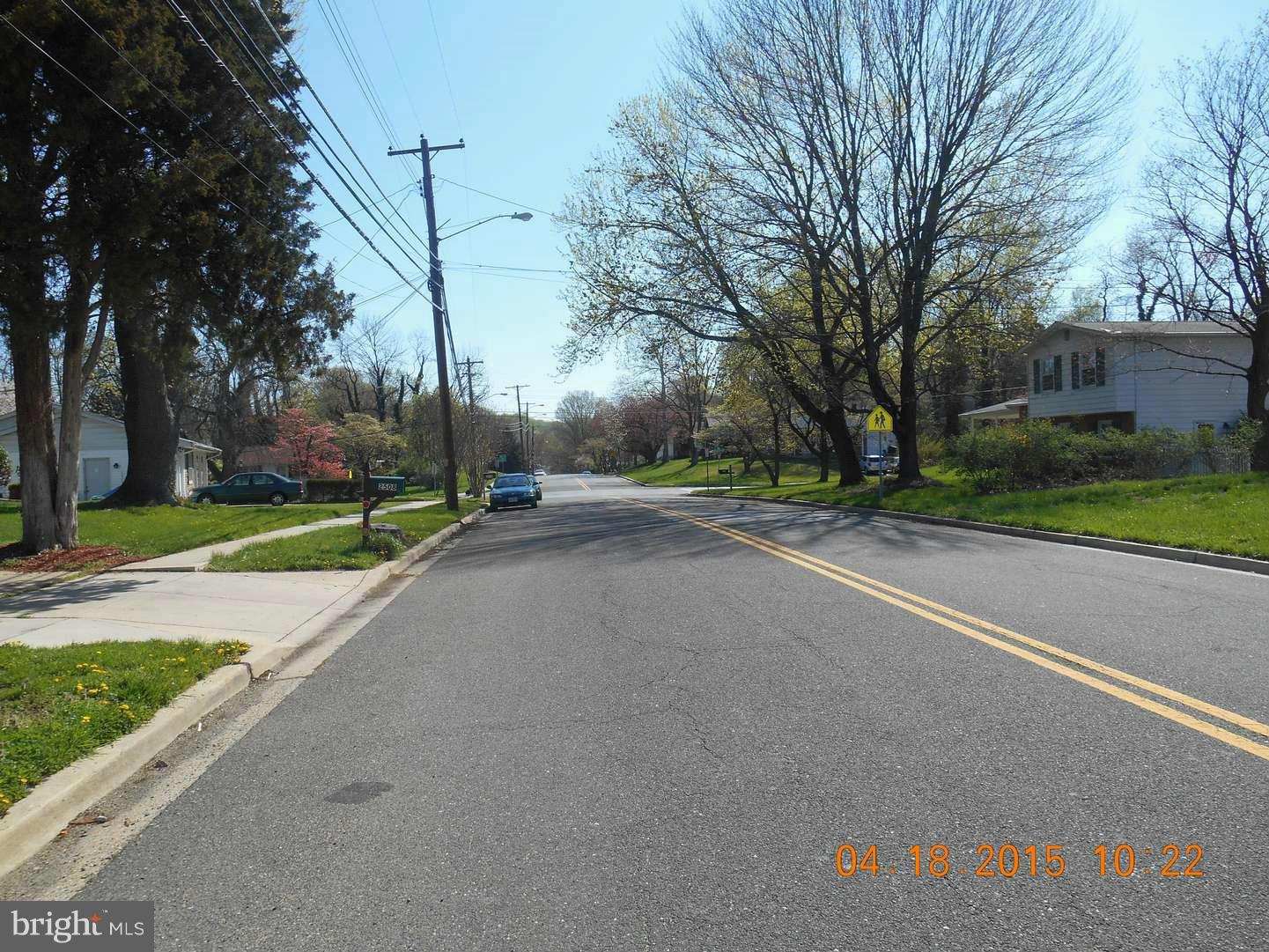 2506 Kingsway Road Fort Washington, MD 20744 - Photo 3 of 8 a view of a street with a house and a play ground