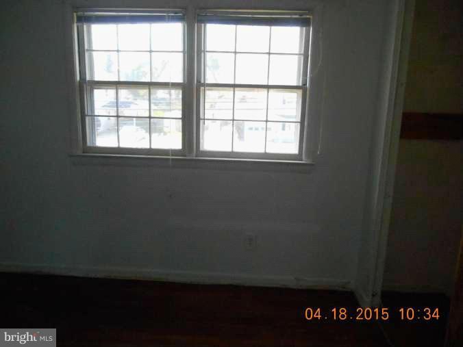 2506 Kingsway Road Fort Washington, MD 20744 - Photo 7 of 8 an empty room with a window