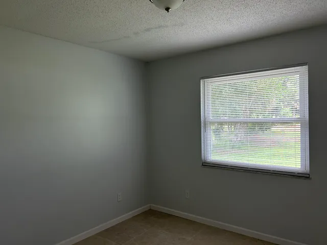 an empty room with a window