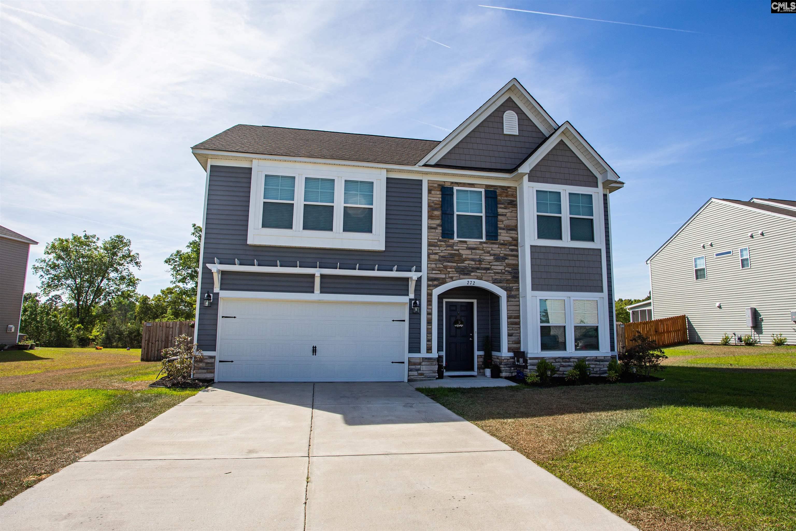 272 Shadowbrook Way Camden, SC 29020 - Photo 1 of 43 a front view of a house with a yard