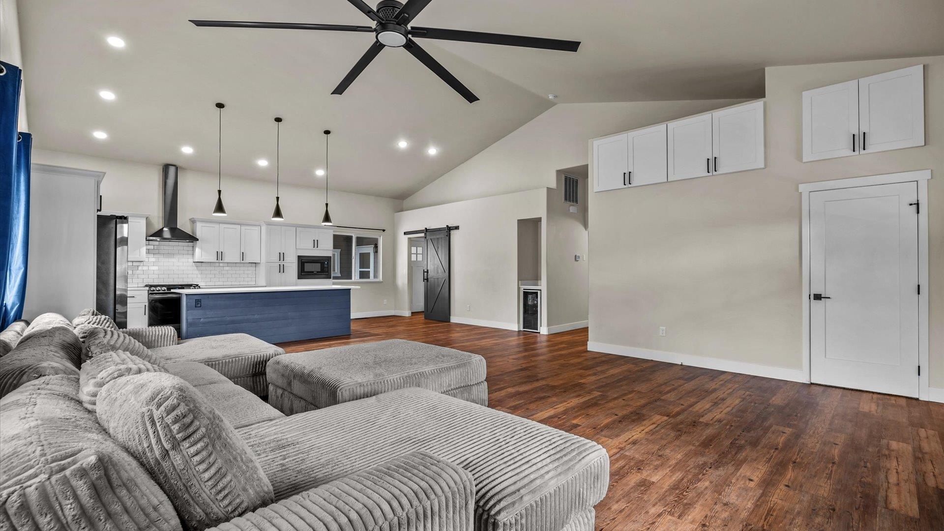 3312 East 1/4 Road Clifton, CO 81520 - Photo 13 of 42 a bed room with a bed and ceiling fan