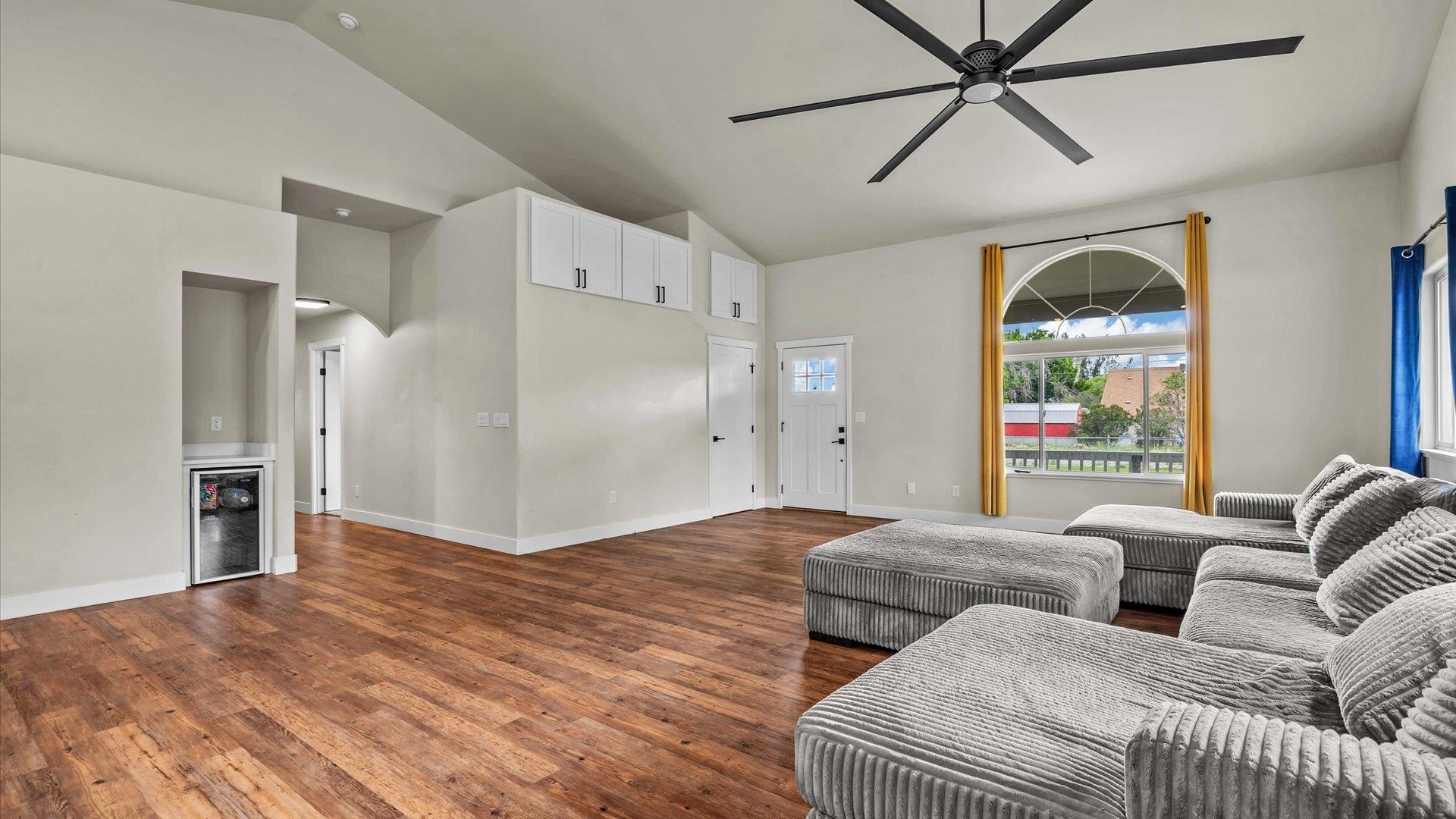 3312 East 1/4 Road Clifton, CO 81520 - Photo 15 of 42 a living room with furniture and a large window