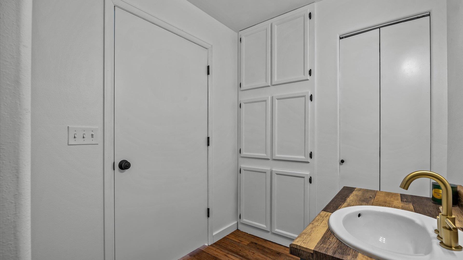 3312 East 1/4 Road Clifton, CO 81520 - Photo 35 of 42 a bathroom with a sink and a mirror