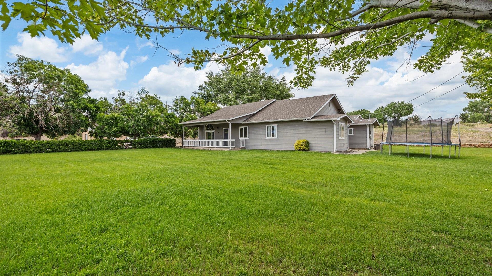 3312 East 1/4 Road Clifton, CO 81520 - Photo 9 of 42 a aerial view of a house with a yard