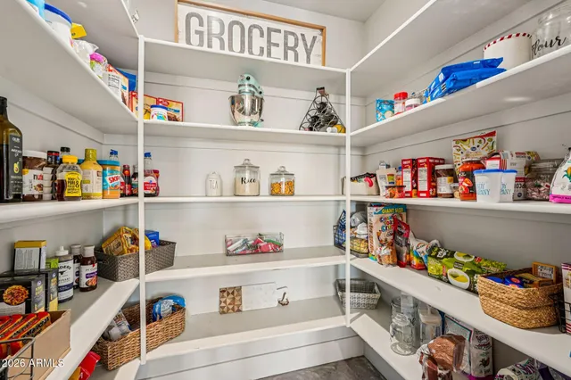 a bathroom with a toilet a sink and a mirror