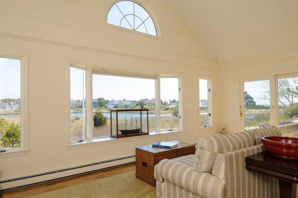19 Nons Road Harwich Port, MA 02646 - Photo 3 of 12 a living room with furniture and a large window