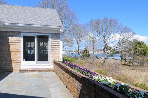 19 Nons Road Harwich Port, MA 02646 - Photo 10 of 12 a front view of a house with garden