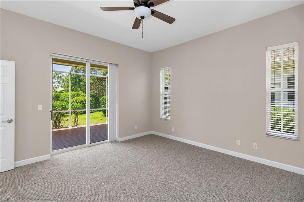 2389 Piccadilly Circus Naples, FL 34112 - Photo 5 of 21 a view of an empty room with a window