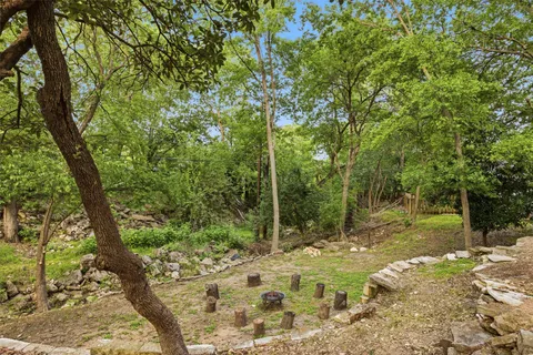 a backyard of a house with lots of green space