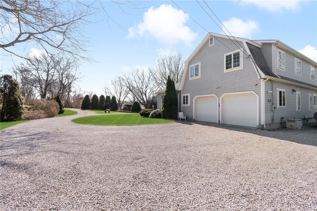 90 Donizetti Road Westerly, RI 02891 - Photo 8 of 32 Two car garage; whole house generator