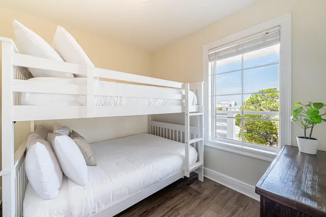 a kitchen with a refrigerator and washer dryer