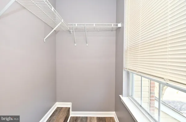 a bathroom with a granite countertop sink toilet and bathtub