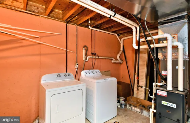 a view of a car parked in front of a brick house