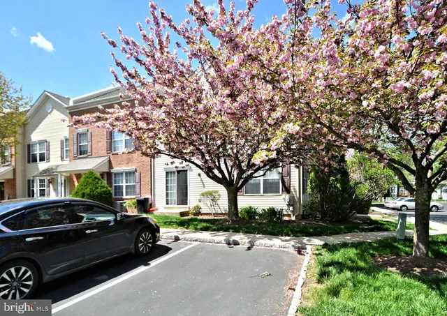 a car parked in front of a house
