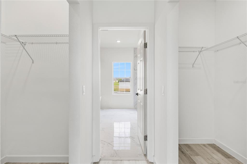 925 Desmoines Way Poinciana, FL 34759 - Photo 27 of 40 a view of a bathroom with a shower