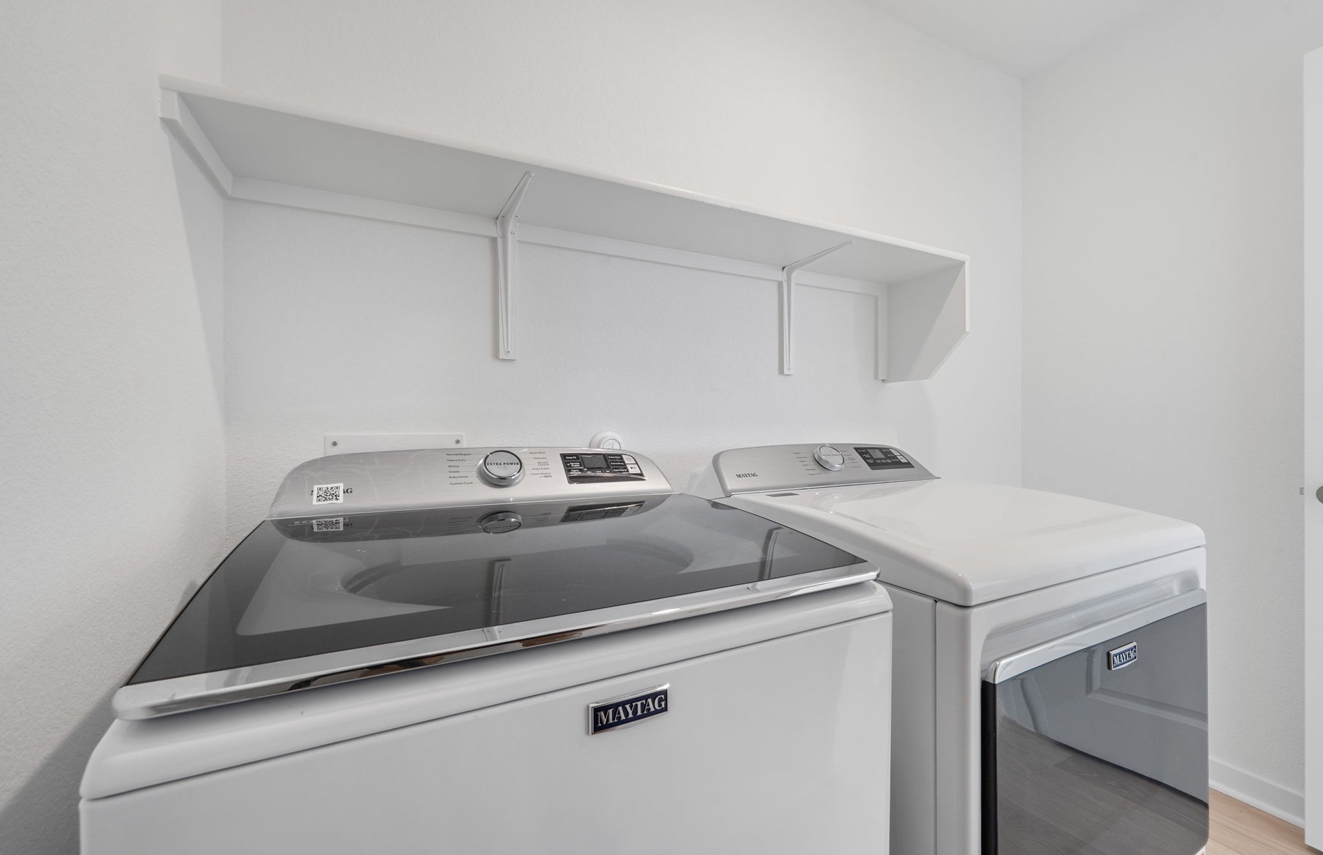 608 Rubber Tree Way Buda, TX 78610 - Photo 16 of 29 a utility room with dryer and washer