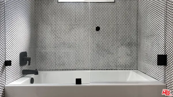 a bathroom with a bathtub