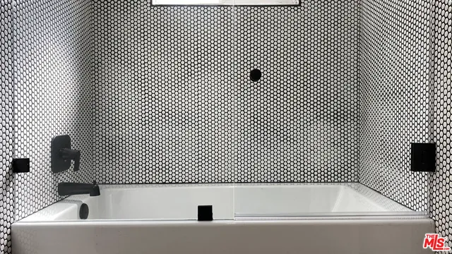 a bathroom with a bathtub