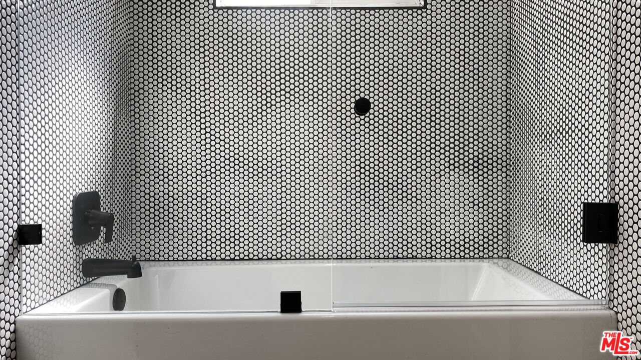 6474 Cavalleri Road Malibu, CA 90265 - Photo 14 of 24 a bathroom with a bathtub