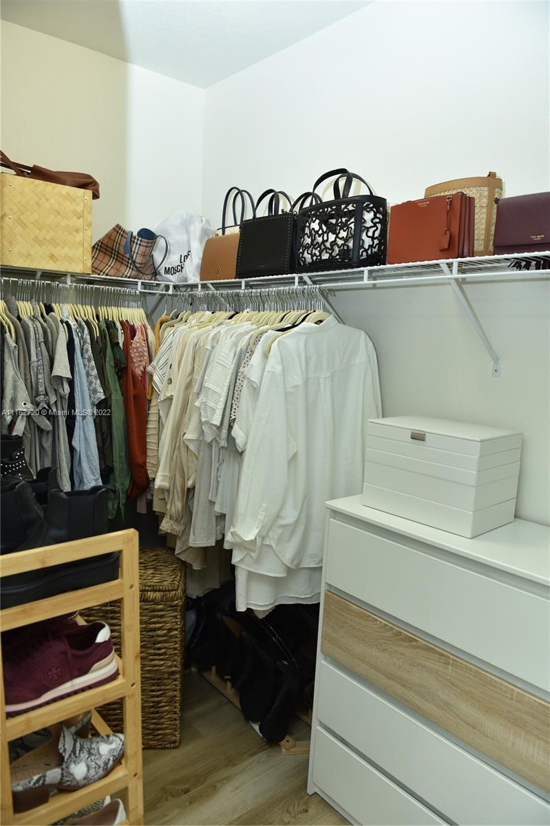 Hialeah Hialeah, FL 33018 - Photo 32 of 60 a view of walk in closet with clothes and shoes
