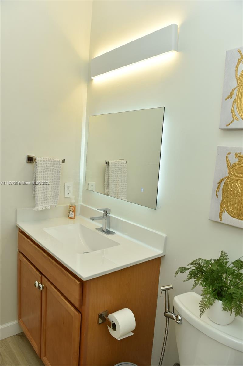 Hialeah Hialeah, FL 33018 - Photo 36 of 60 a bathroom with a sink and a mirror