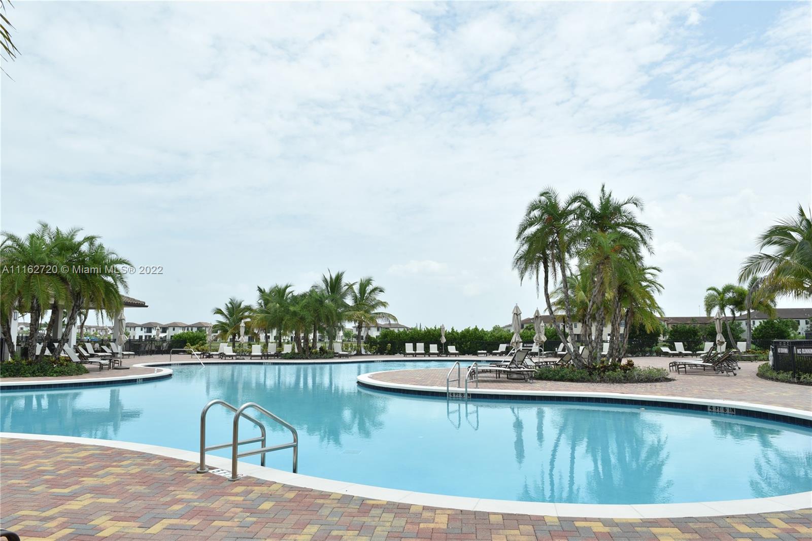Hialeah Hialeah, FL 33018 - Photo 55 of 60 a view of swimming pool with outdoor seating and lake