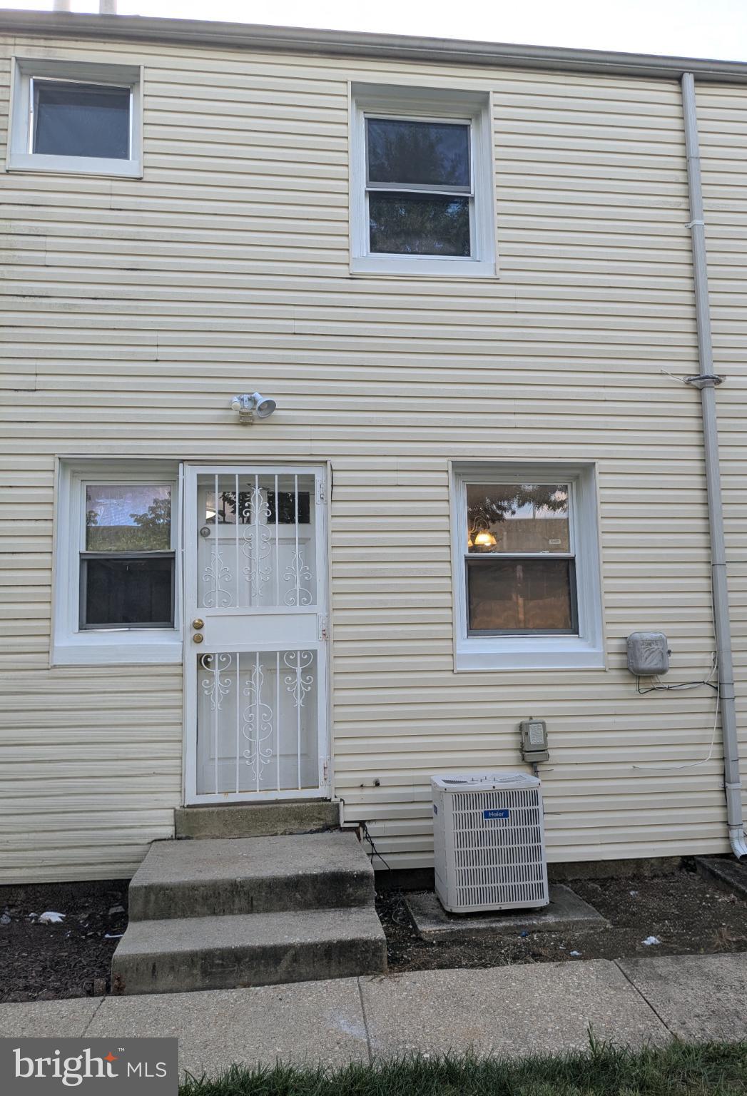 2834 Iverson Street, Unit 101 Temple Hills, MD 20748 - Photo 13 of 13 a view of a house with white door