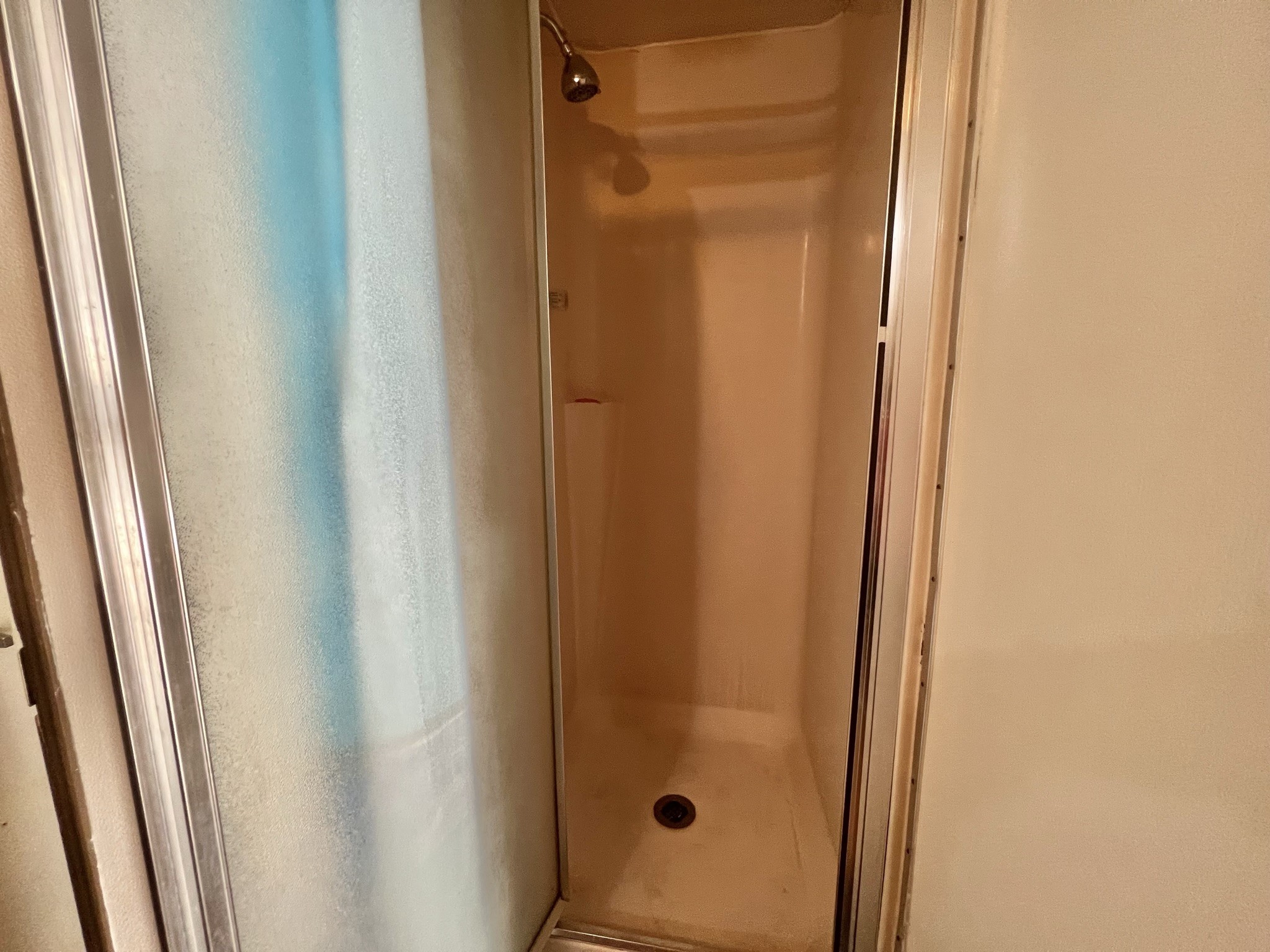 2749 Wagon Trail Road Pearland, TX 77584 - Photo 14 of 18 a bathroom with a glass door