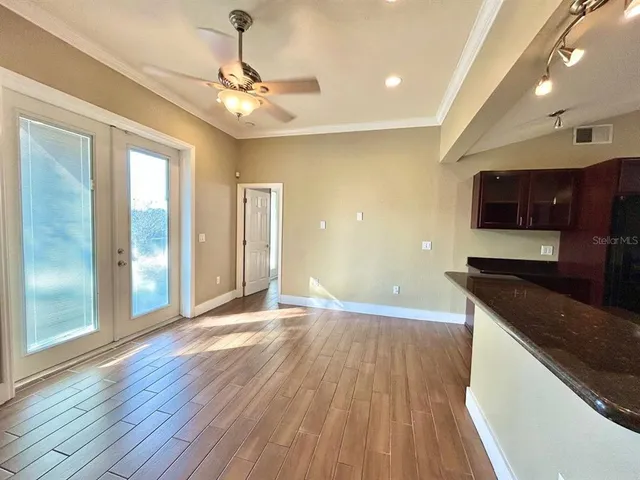a view of a kitchen with a sink and a microwave