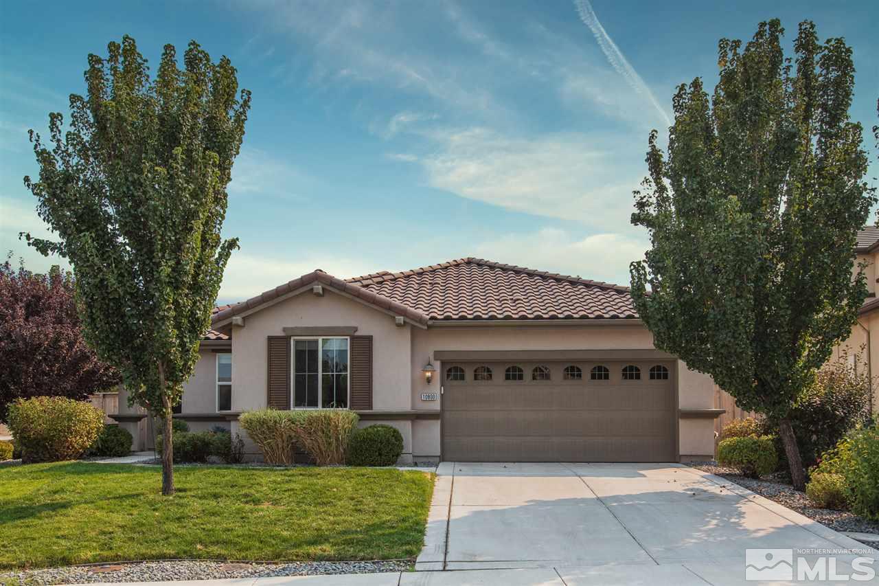 10800 Pebble Hill Drive Reno, NV 89521 - Photo 1 of 21 a front view of a house with a yard