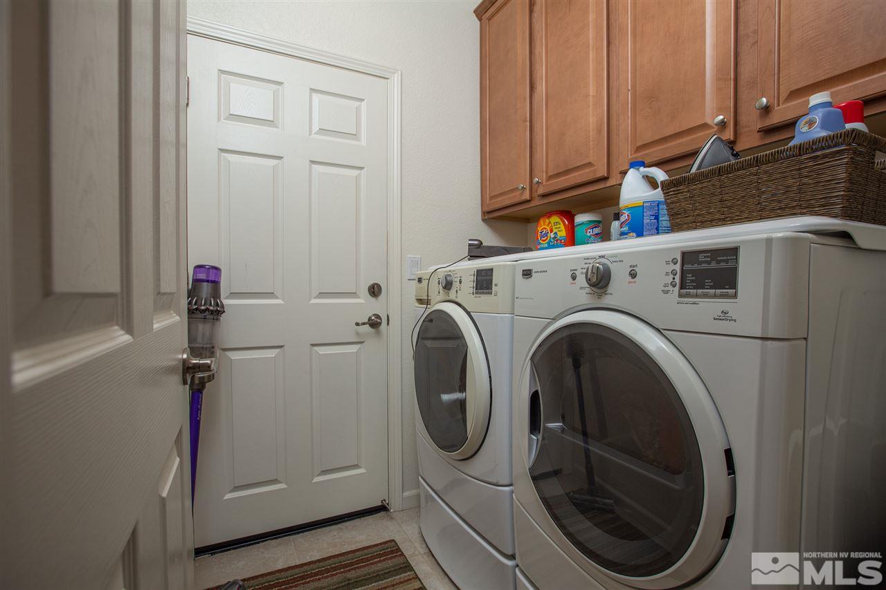 10800 Pebble Hill Drive Reno, NV 89521 - Photo 15 of 21 a utility room with dryer and washer