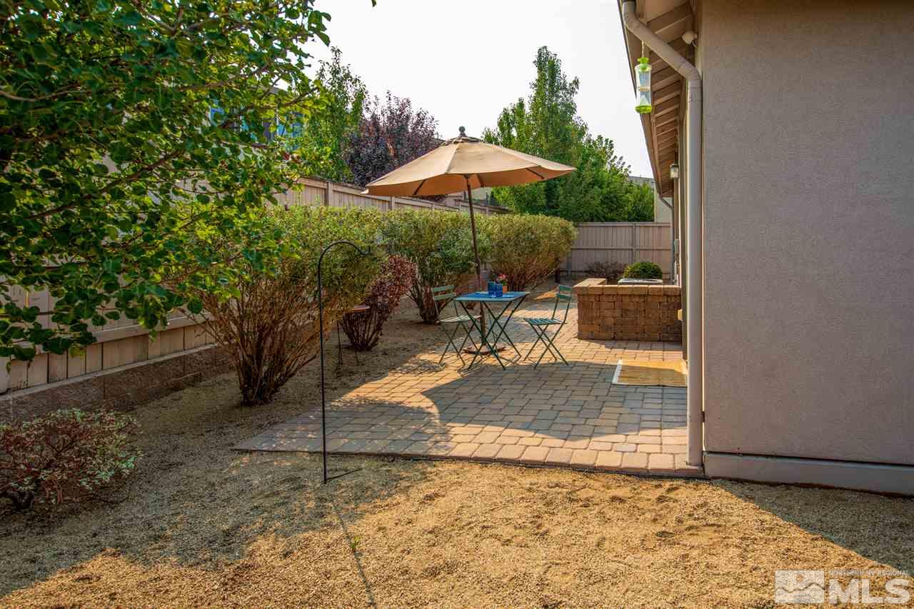 10800 Pebble Hill Drive Reno, NV 89521 - Photo 16 of 21 a view of backyard with outdoor seating