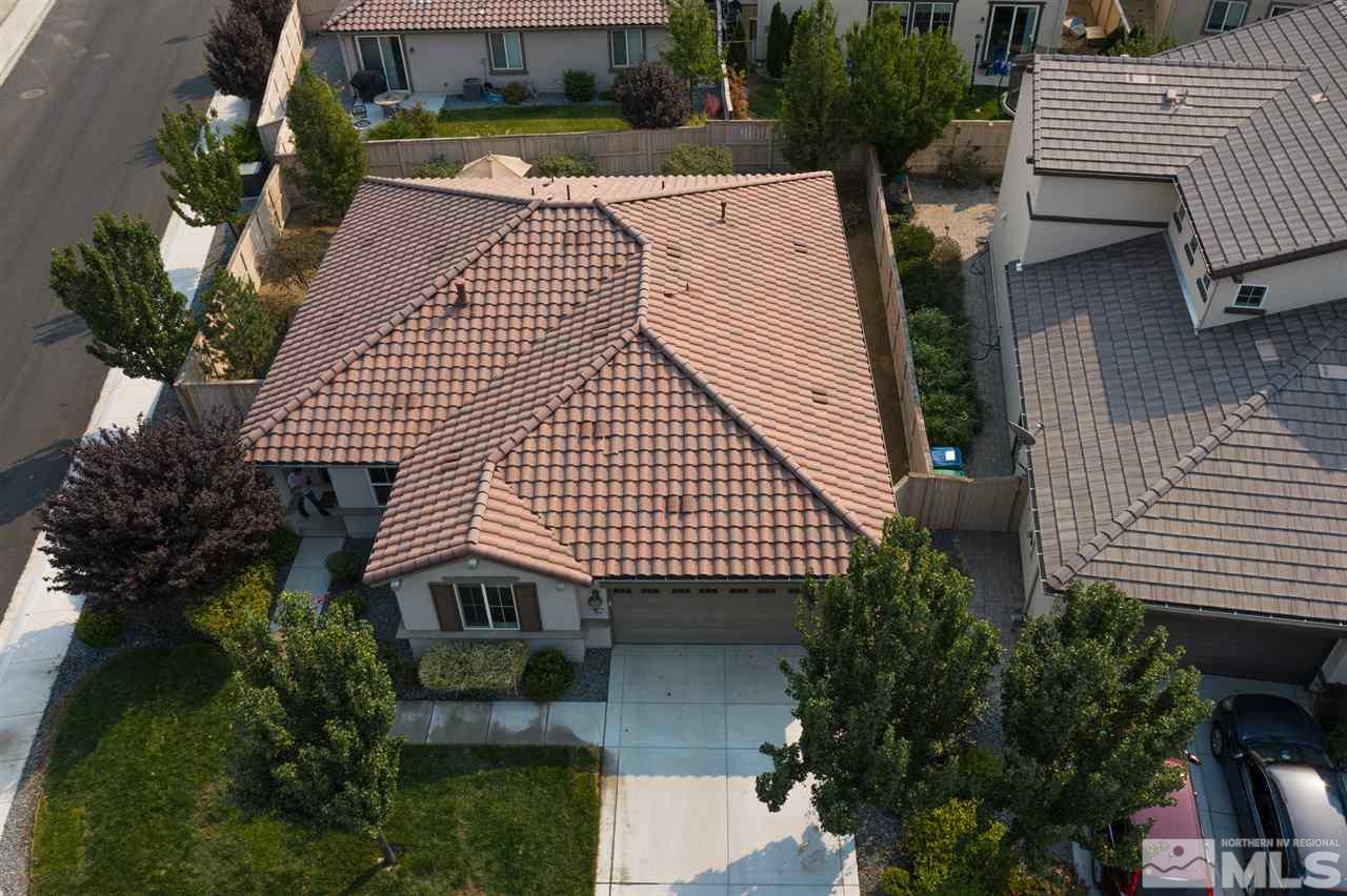 10800 Pebble Hill Drive Reno, NV 89521 - Photo 19 of 21 a front view of a house with garden