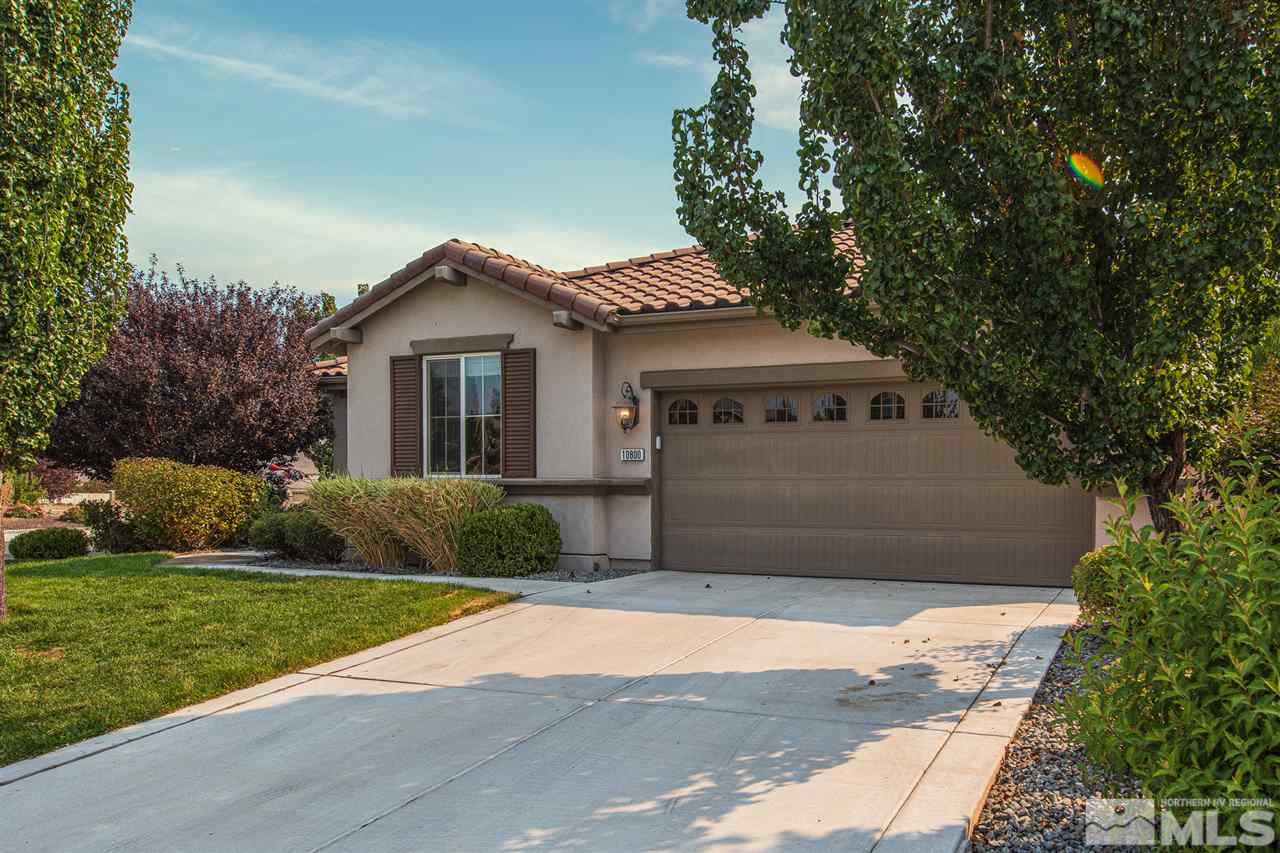 10800 Pebble Hill Drive Reno, NV 89521 - Photo 2 of 21 a front view of a house with a yard