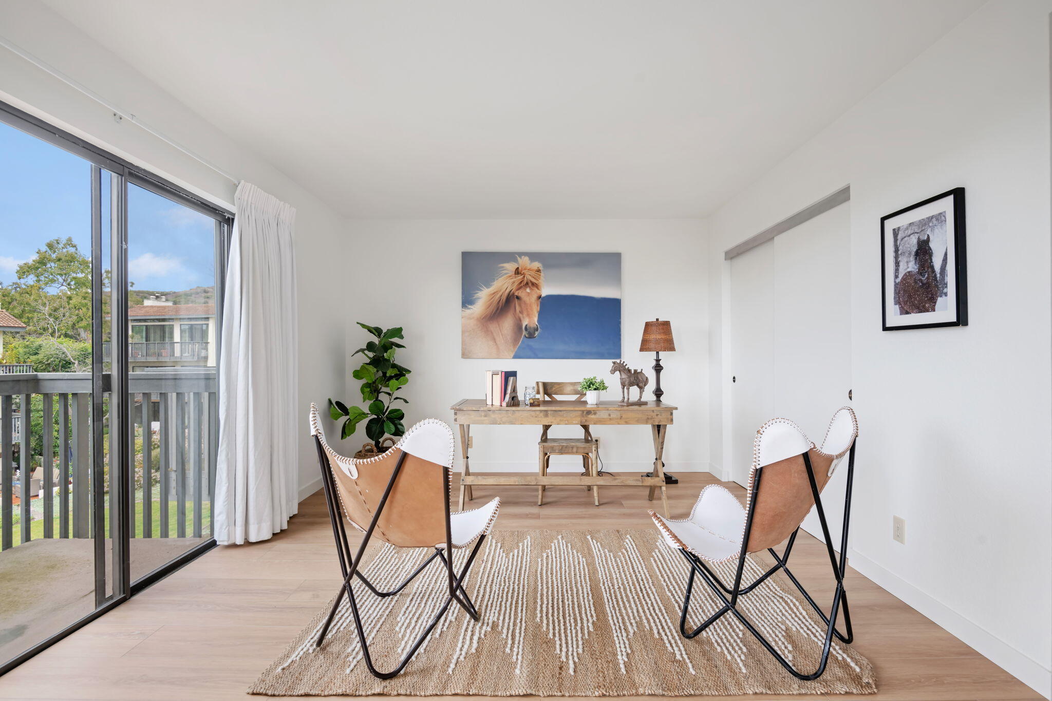 3375 Foothill Road, Unit 231 Carpinteria, CA 93013 - Photo 7 of 28 a workspace room with furniture and wooden floor