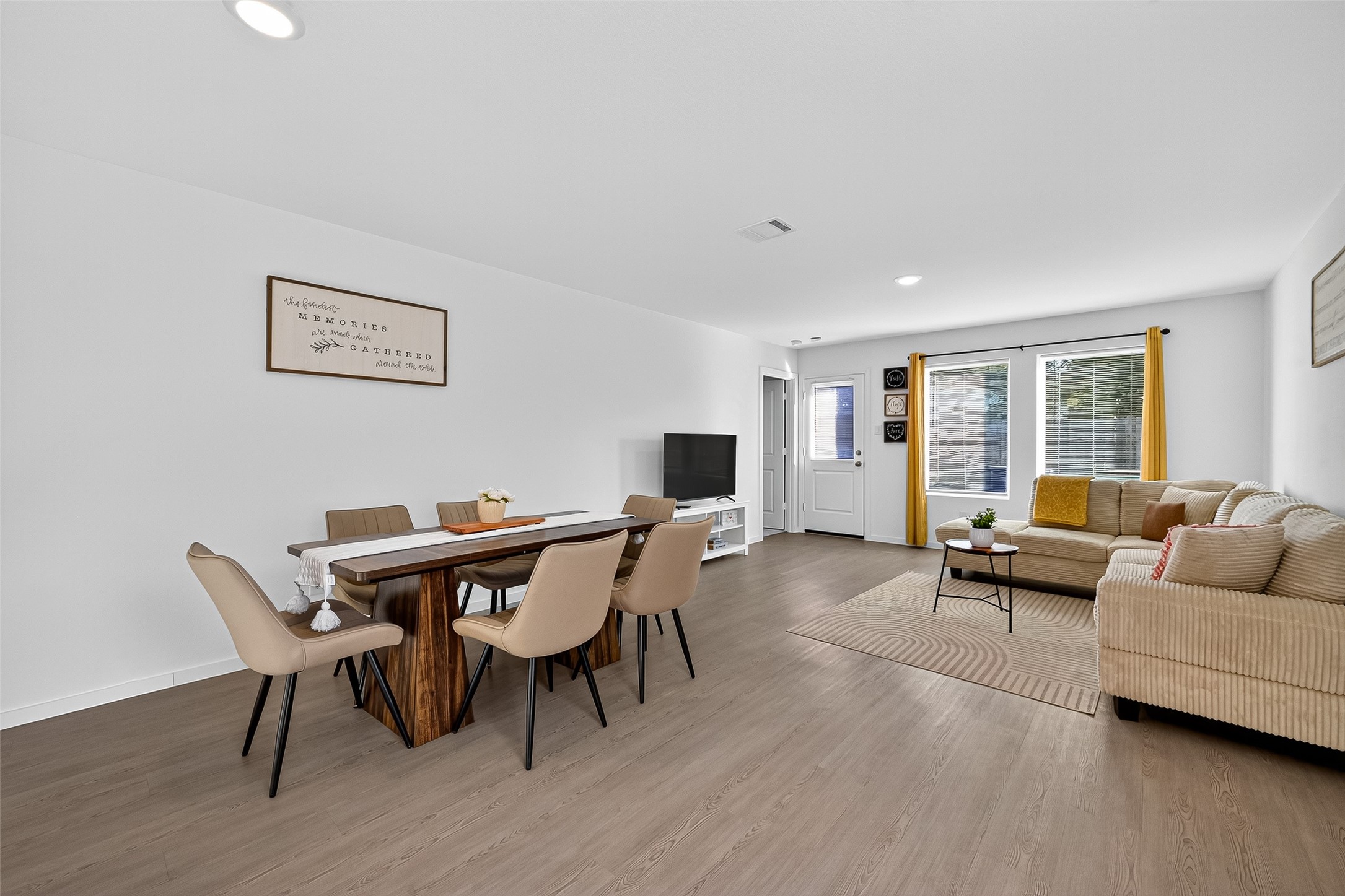 228 Laura Leigh Lane Angleton, TX 77515 - Photo 15 of 37 a living room with furniture and a flat screen tv