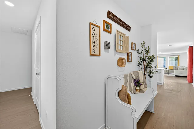 a bathroom with a sink a vanity and toilet