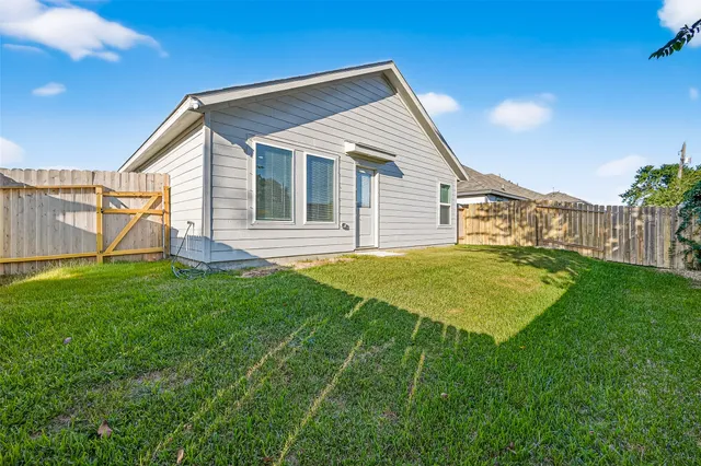 a view of a backyard with of a tree