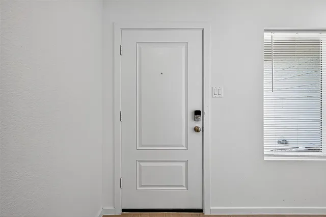 a kitchen with cabinets a sink and appliances