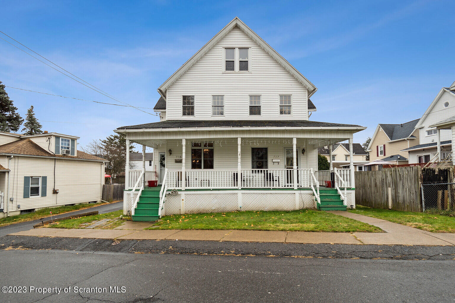 715 Landis Street Scranton, PA 18504 - Photo 1 of 15 a view of a house with a yard and plants