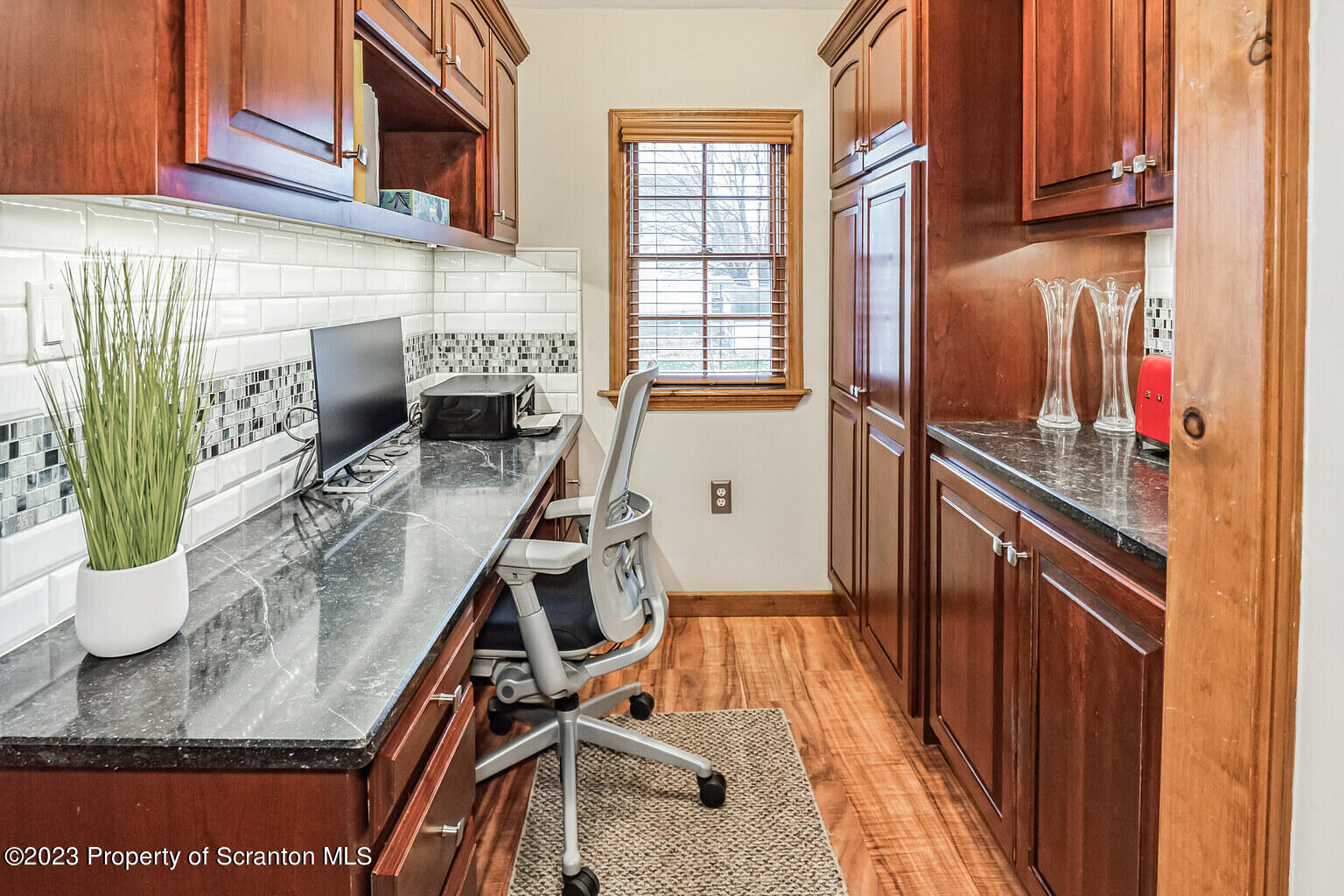 715 Landis Street Scranton, PA 18504 - Photo 5 of 15 a kitchen with a sink appliances and cabinets