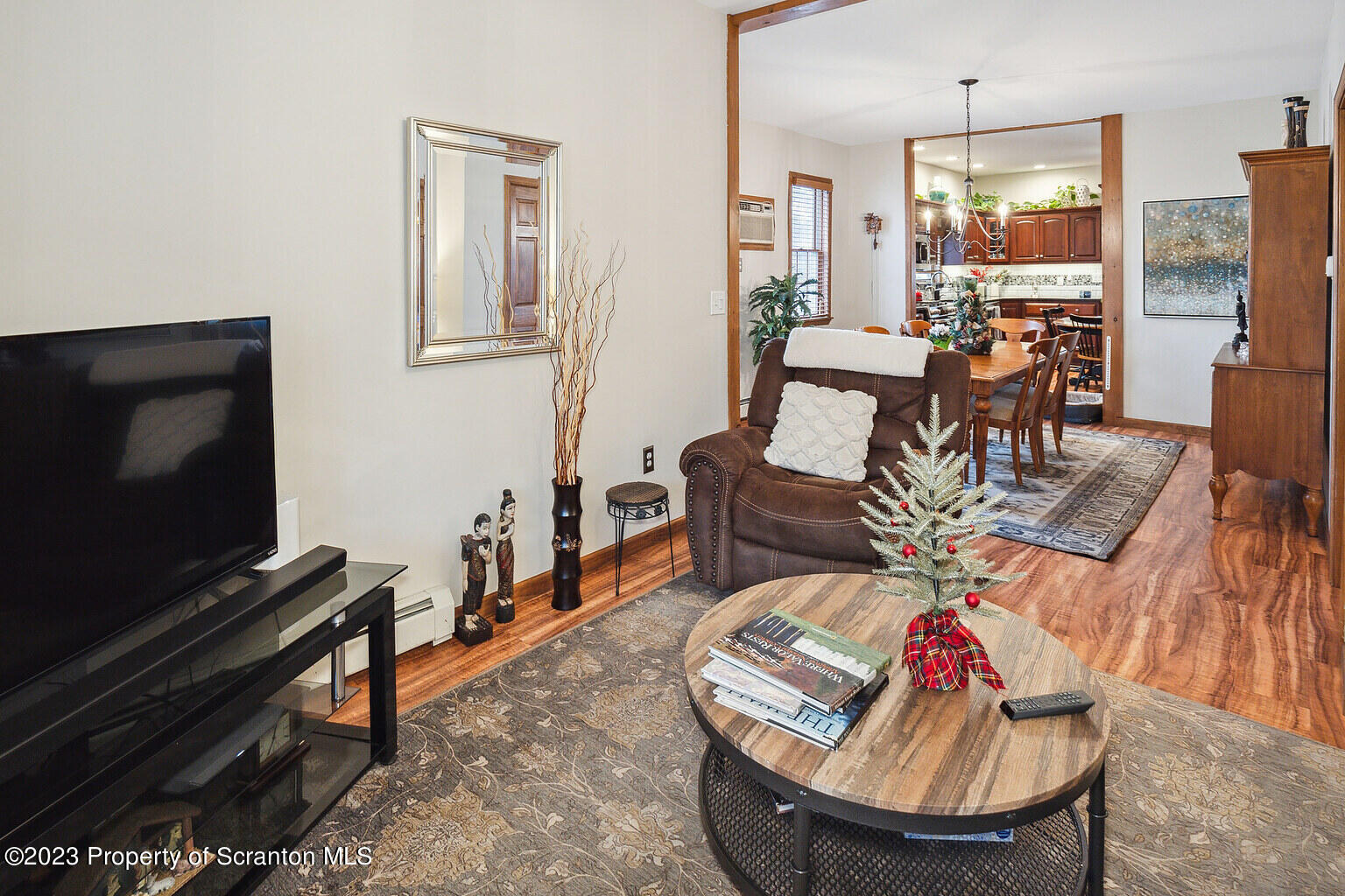 715 Landis Street Scranton, PA 18504 - Photo 7 of 15 a living room with furniture and a flat screen tv