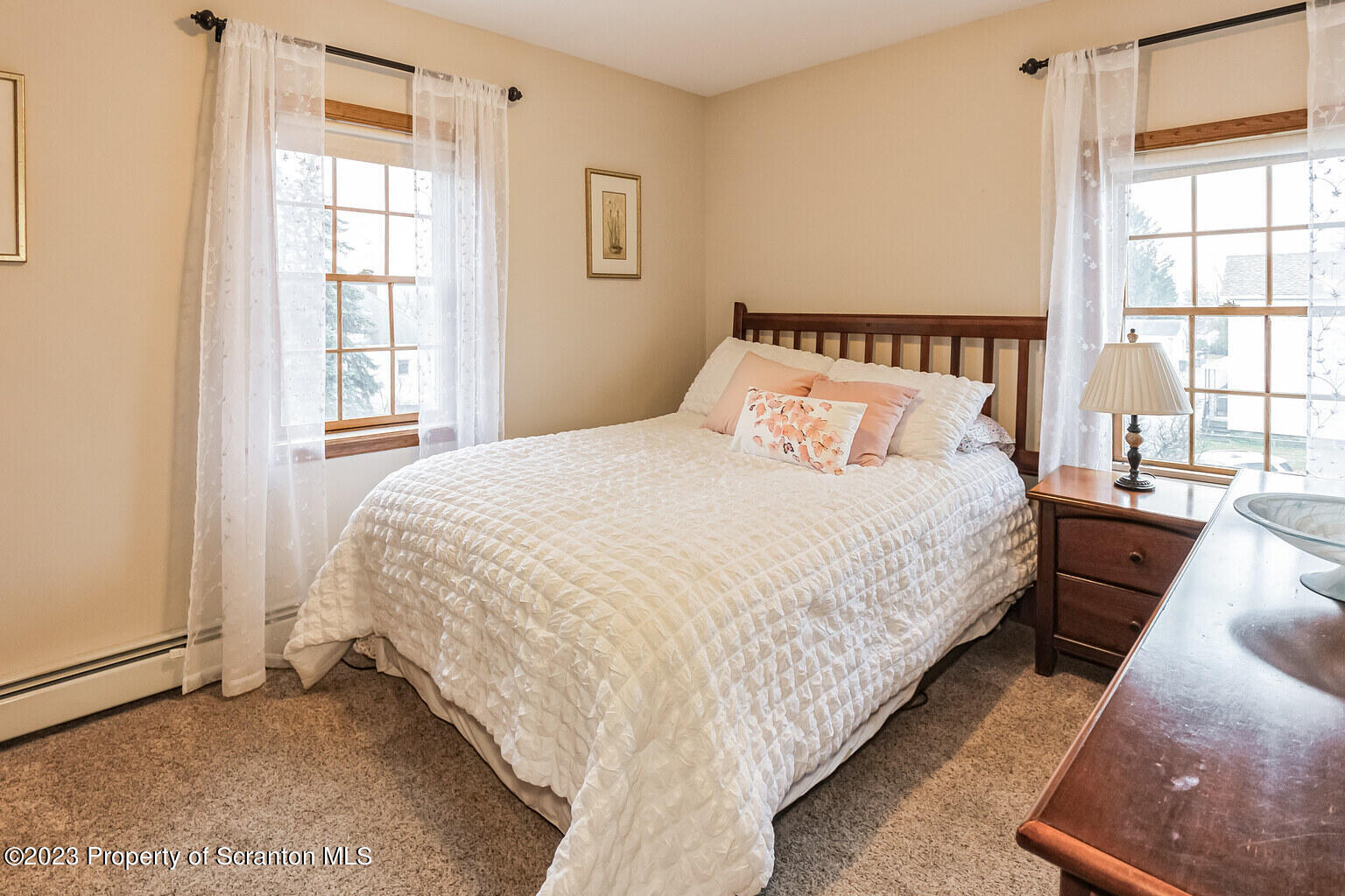 715 Landis Street Scranton, PA 18504 - Photo 9 of 15 a bedroom with bed and a window